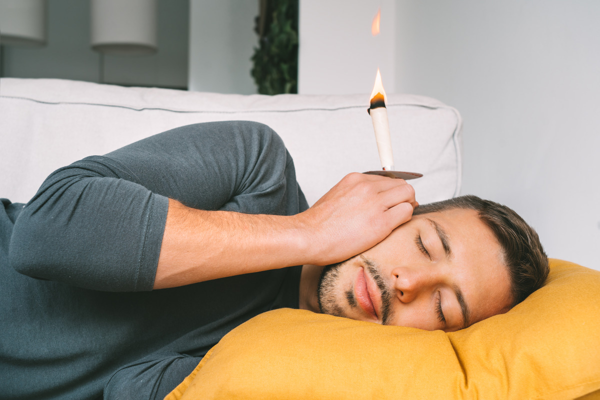 Ear candling for removing ear wax