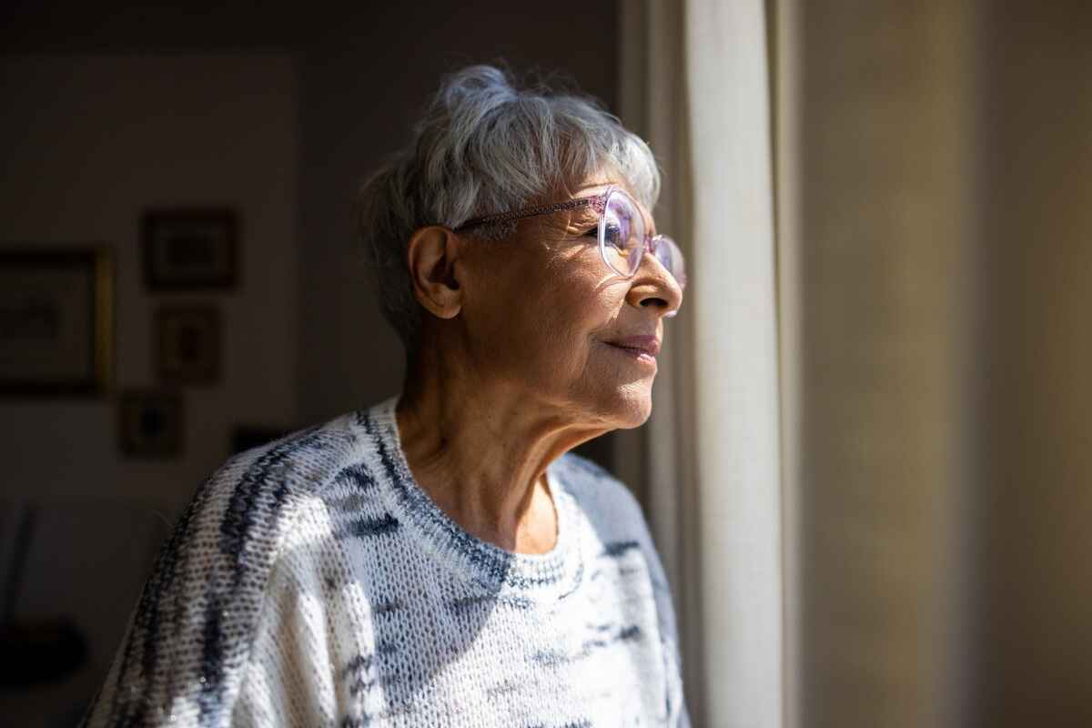 Elderly woman wonders if her age related memory loss is forgetfulness or dementia