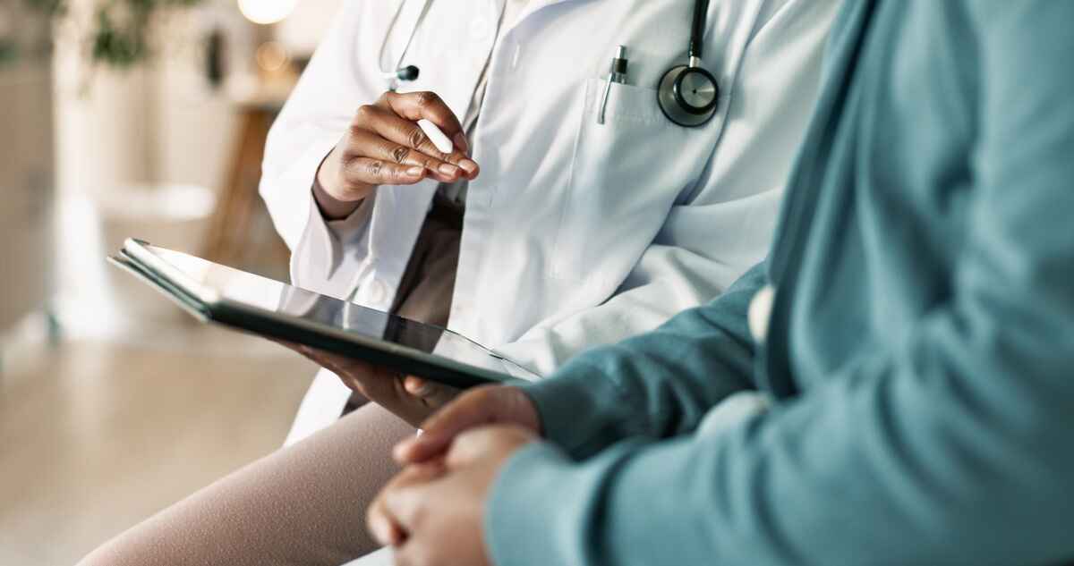 Doctor shares test results with patient